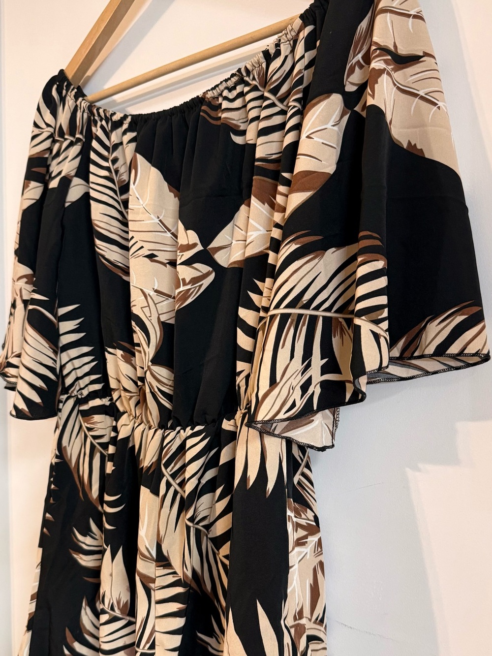 Lizzie’s Boutique Off-Shoulder Black and Beige Tropical Print Romper - Picture 9 of 13